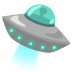 A picture of an alien spaceship with its lights on.
